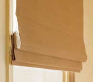 side view of Roman blind showing cord and folding panel structure